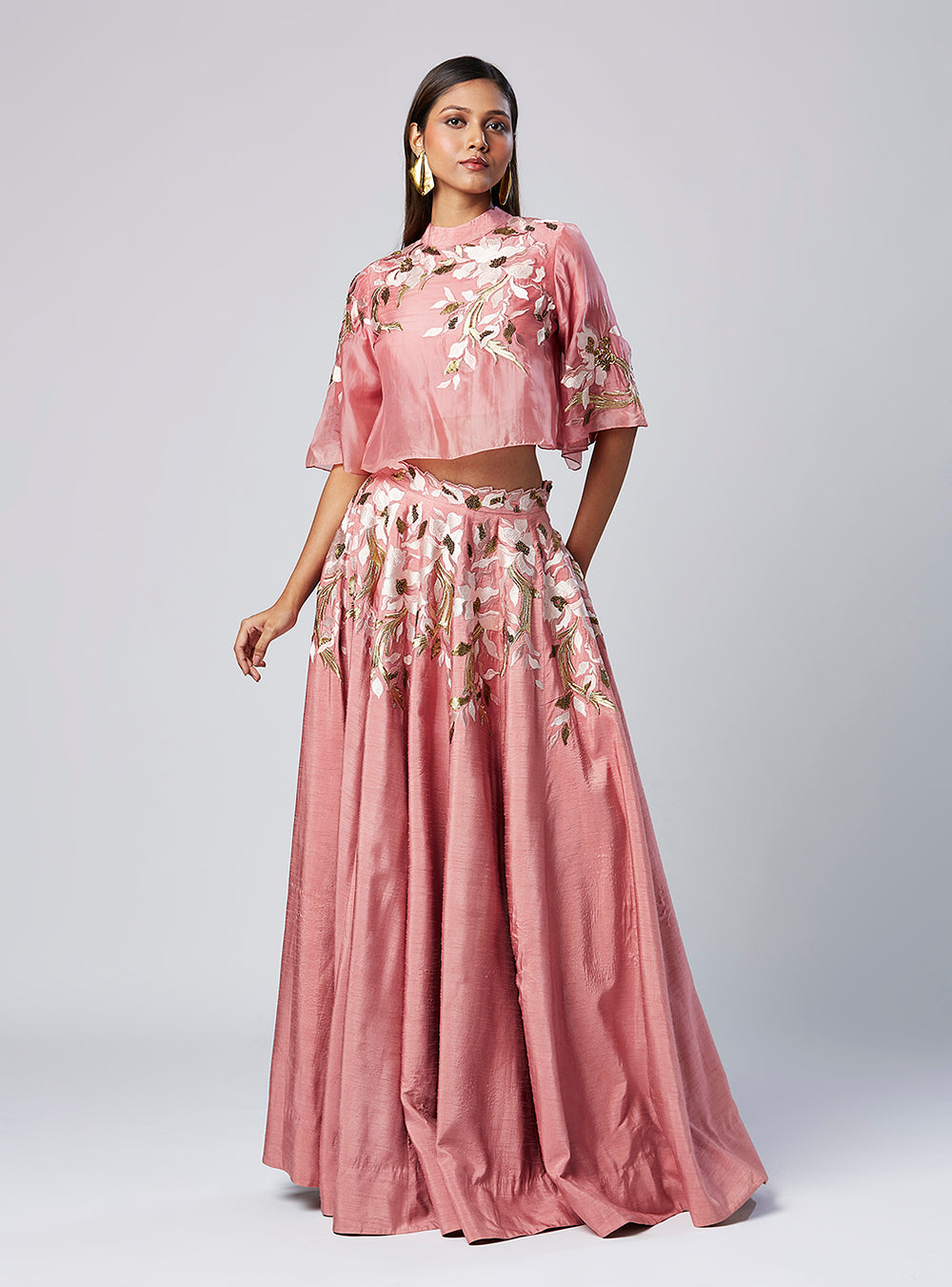 Embroidered Crop Top And Solid Panelled Skirt Set