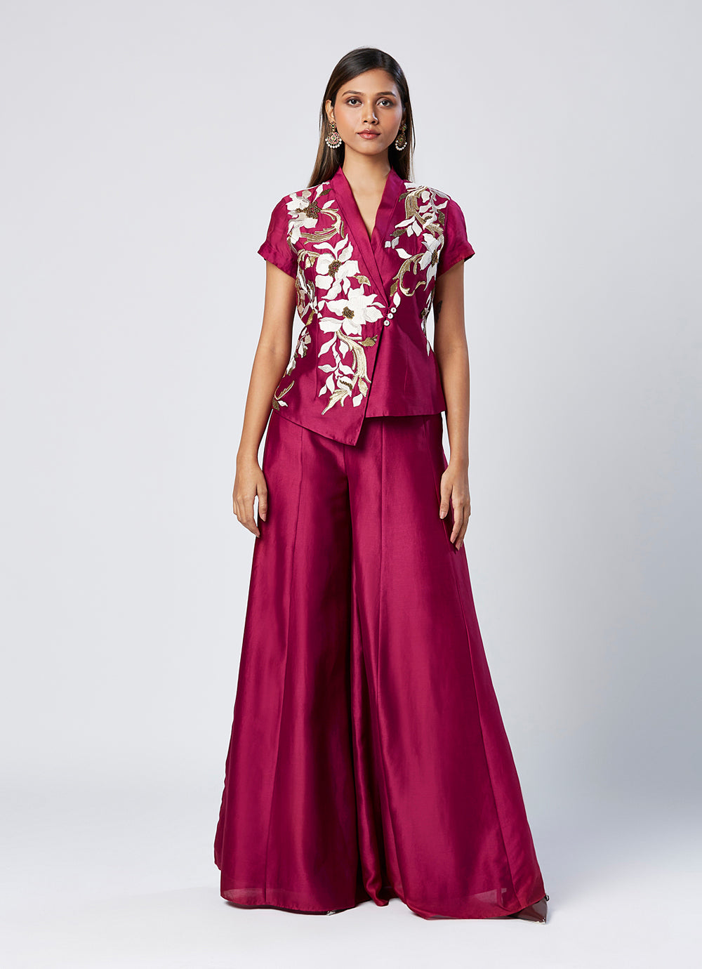 Embroidered Vest And Solid Flared Pant Set