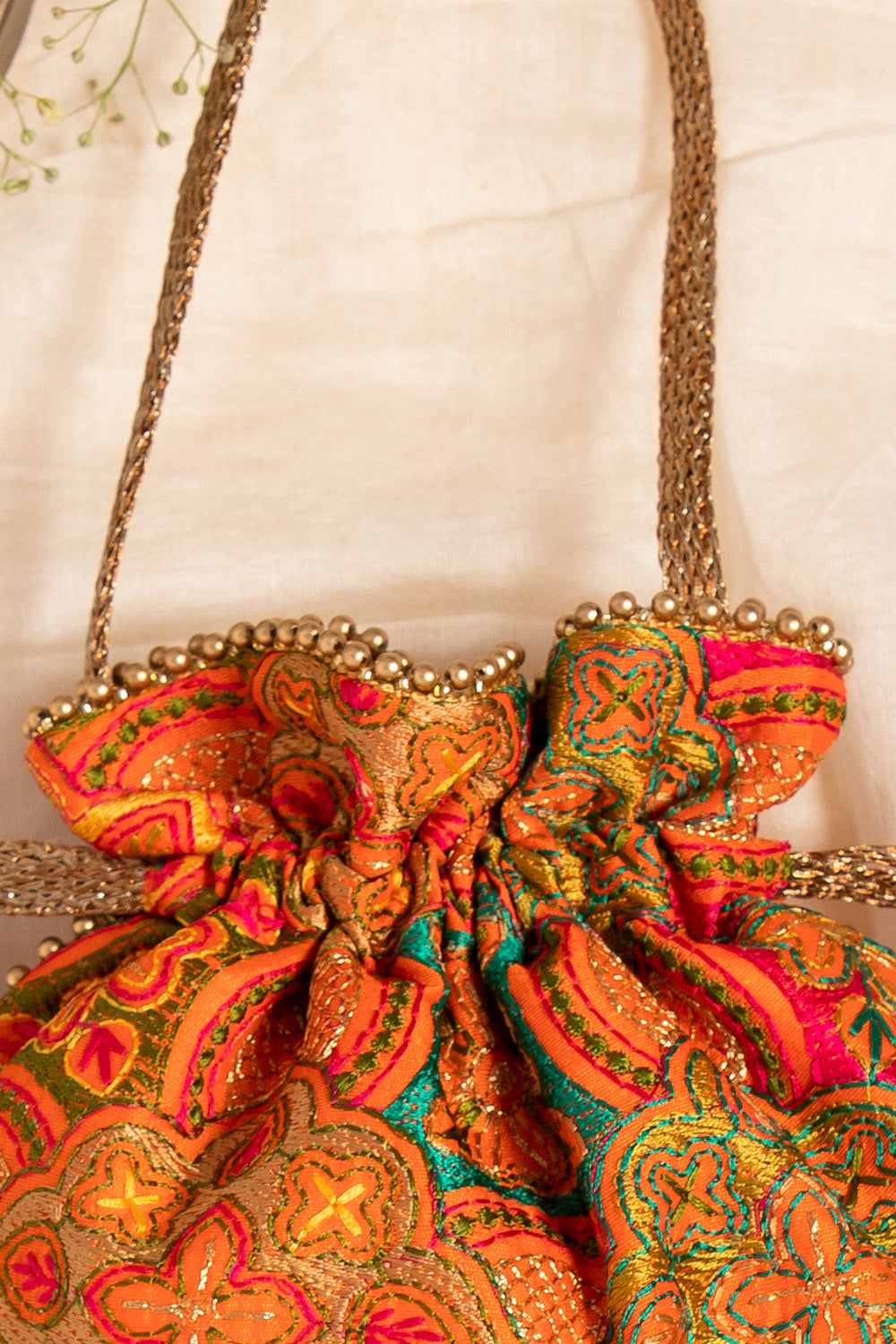 Amna Embroidered Potli Bag Orange