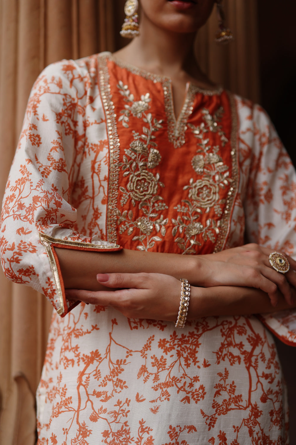 Cream Orange Printed And Hand Embroidered Kurta Set